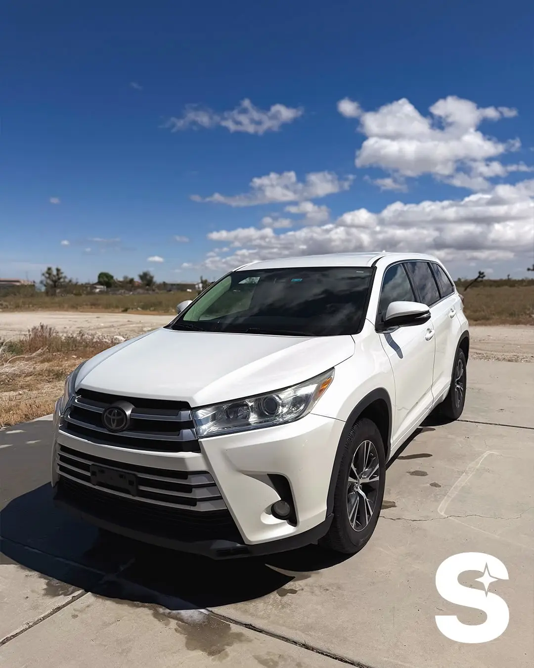 White Toyota Highlander after a full exterior reset