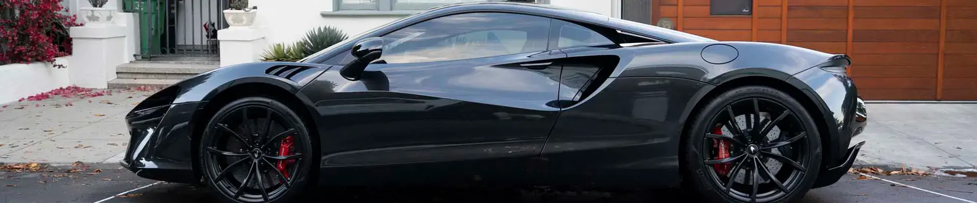 Black McLaren Artura on the street after a Show Car detail
