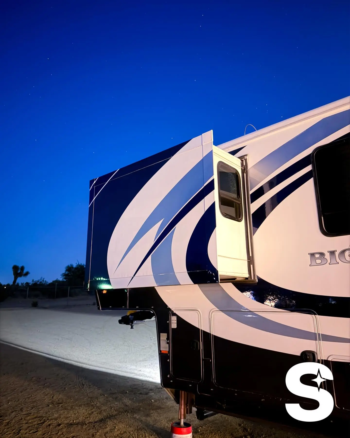 Bigfoot RV trailer freshly washed at night before its trip to Utah